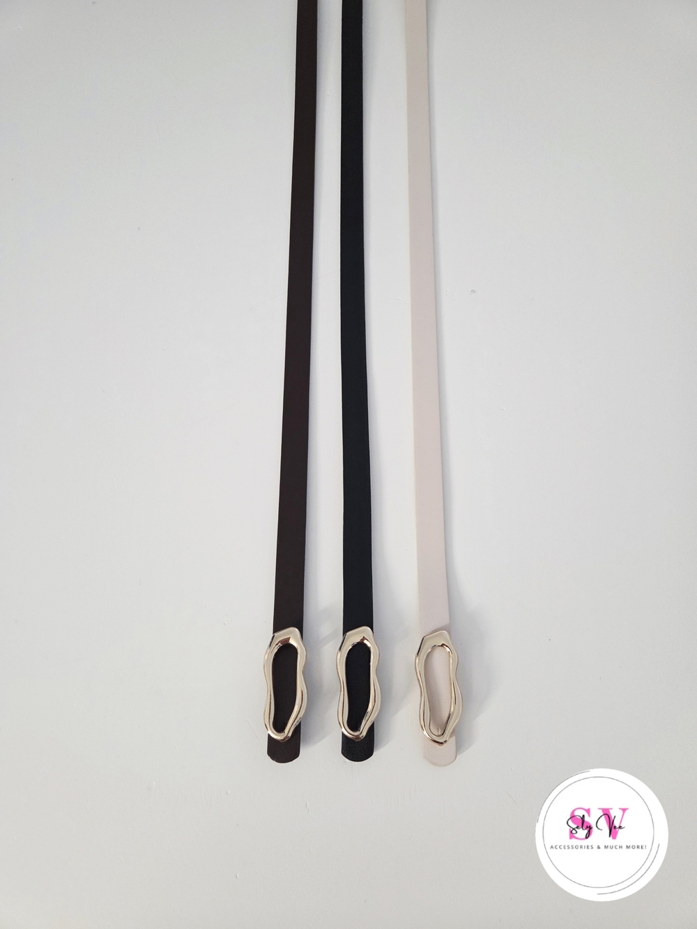 Bundle of 3 belts (black, brown and beige with gold buckles)